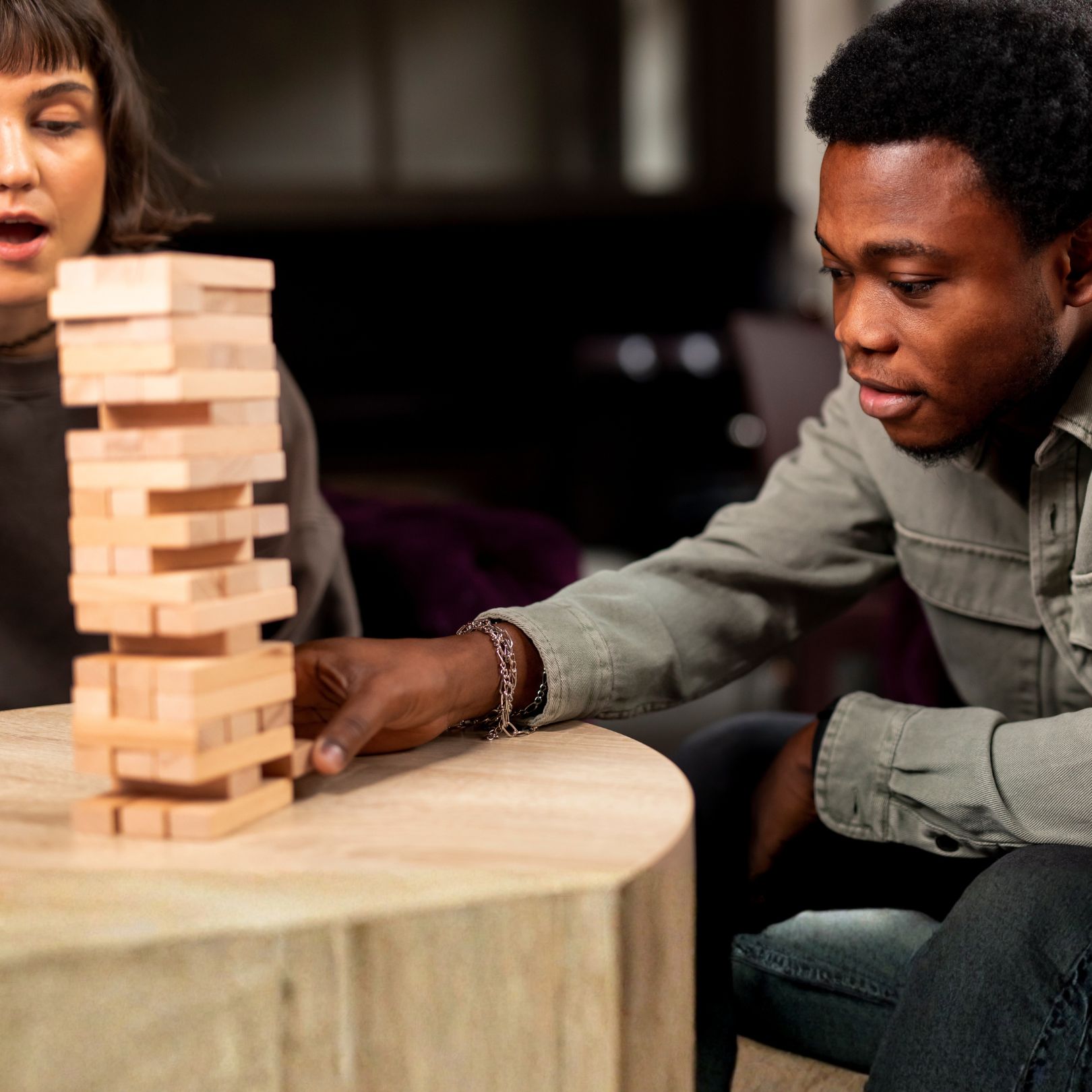 MAAB team members engaged in a hands-on problem-solving activity.